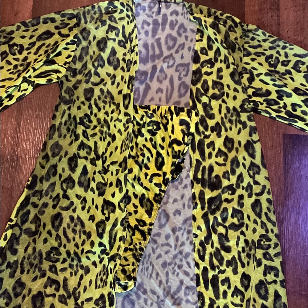 Swimsuit- 1 piece and sheer cover up.